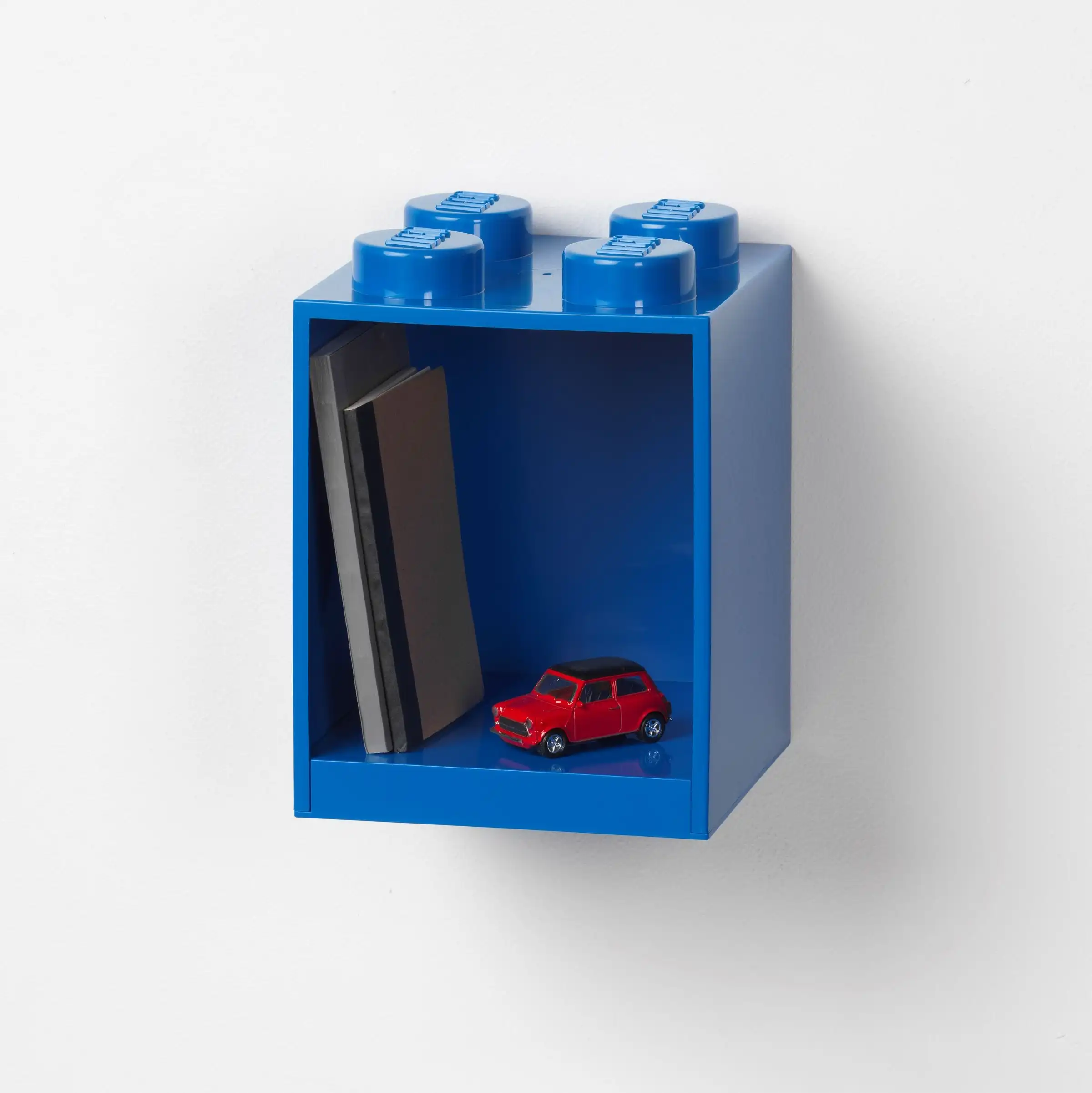 Zdjecie zestawu LEGO 5007280  Półka w kształcie klocka z czterema wypustkami - niebieska 2